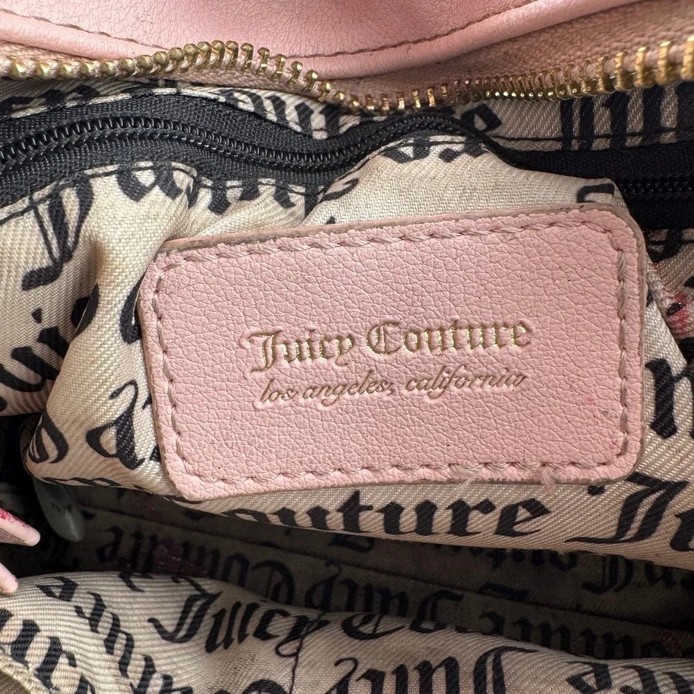 Y2K Juicy Couture satchel in pink, features an all-over embossed 